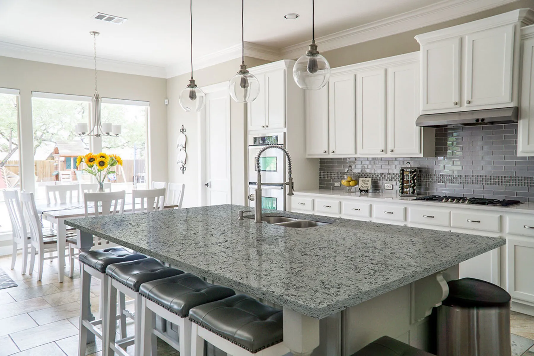 White napoli granite with white cabinets